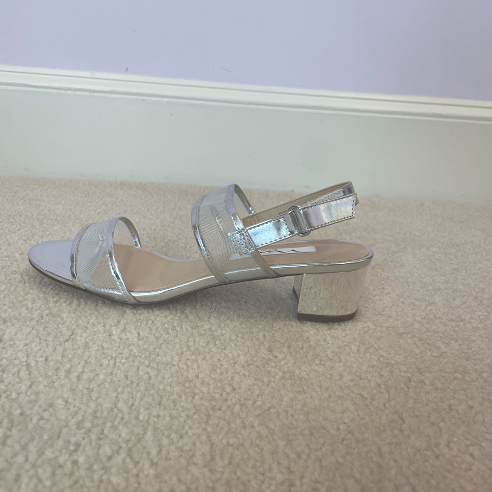 Size 8 never worn silver shoes, 1.5 in heel, velcro strap